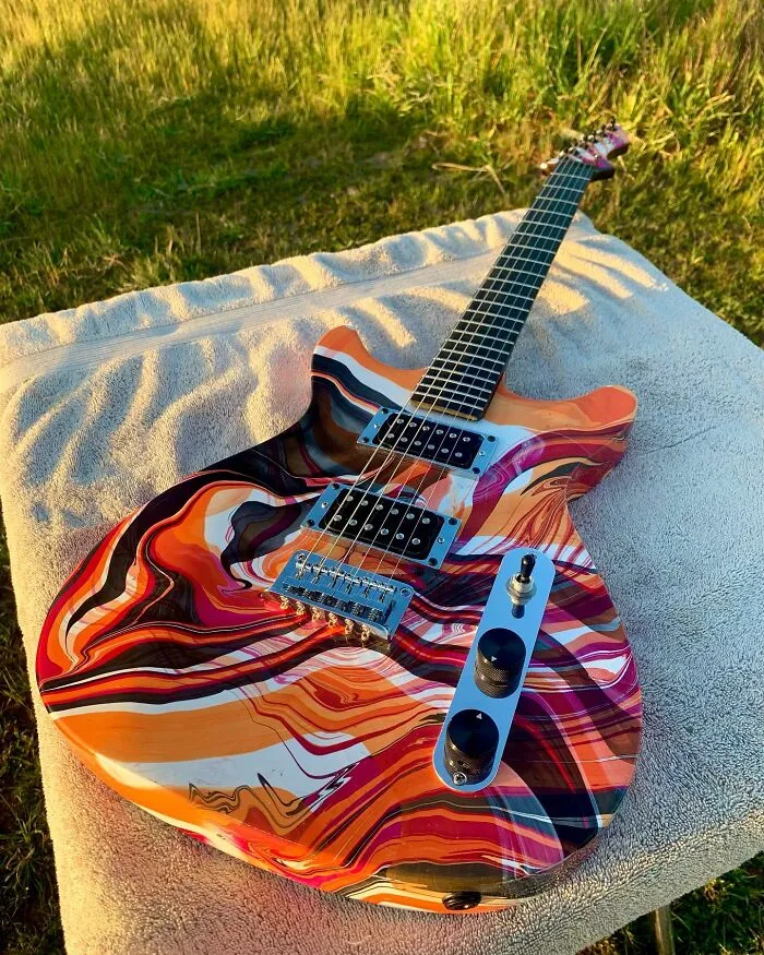 Burls Art Crafted 28 Extraordinary Guitars Using Unconventional Materials
