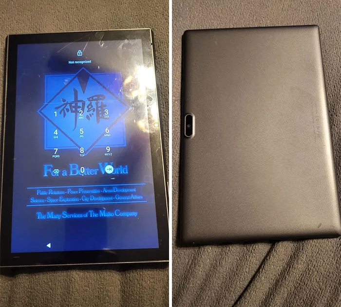 Tablet found while dumpster diving, with screen displaying a logo and message. Back view showing minimal wear.
