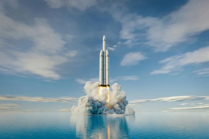 Rocket launching into the sky over water, symbolizing new heights for funny email sign-offs.