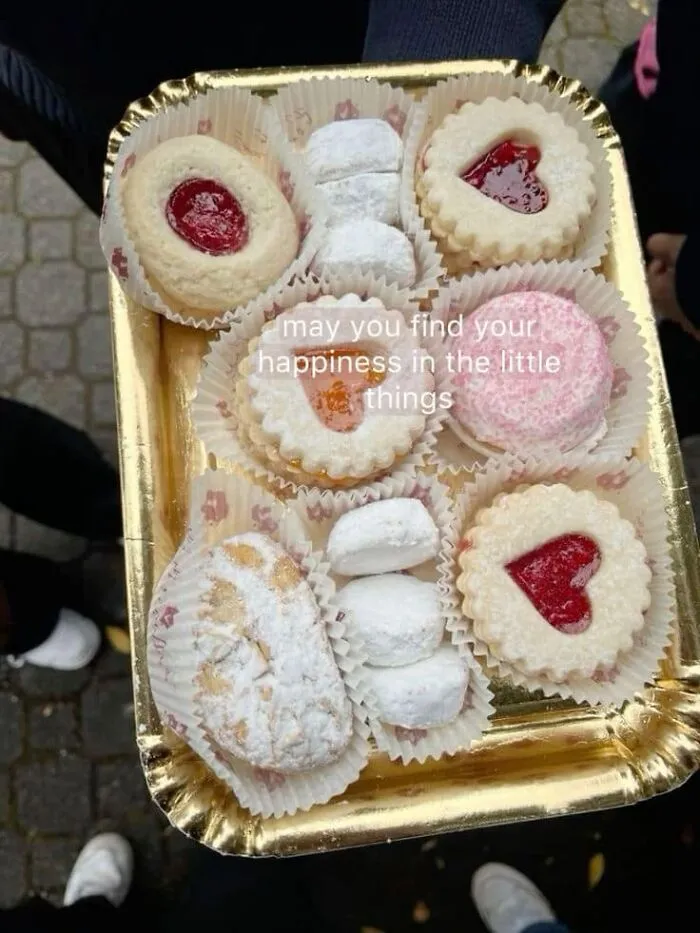 Assorted cookies on a gold tray with a sweet message, perfect for a "girly things" themed moment.