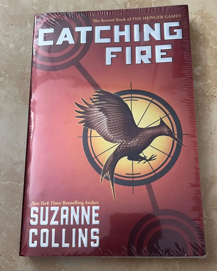 "Catching Fire (The Hunger Games)" By Suzanne Collins