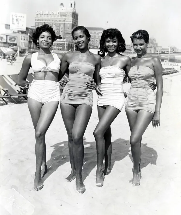 Group Of Friends Enjoys The Beach And Sun In The 1940s