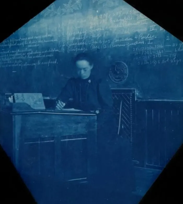 Unknown Photographer. School Teacher At Her Desk 1899. Cyanotype