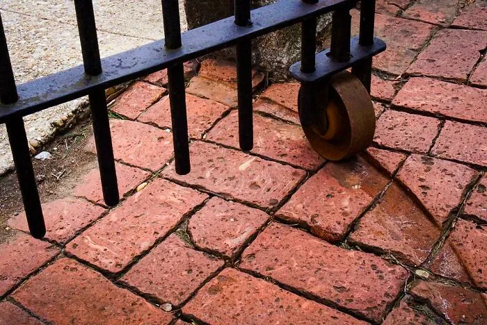 The Way This Rolling Iron Gate Has Worn A Track Into The Bricks