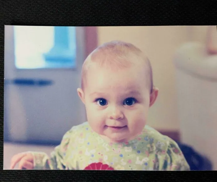 Found In A Book Of Poetry Purchased In Used Bookstore. The Back Of The Photo Has "1 Year Old" And "1999" Written On It. I Hope This Now 25-Year-Old Is A Happy Reader