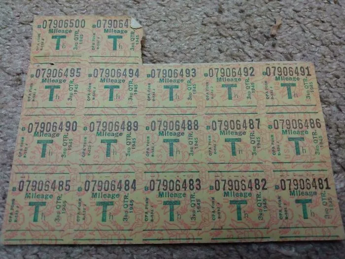 Unique bookmarks made from vintage mileage tickets on a textured surface.