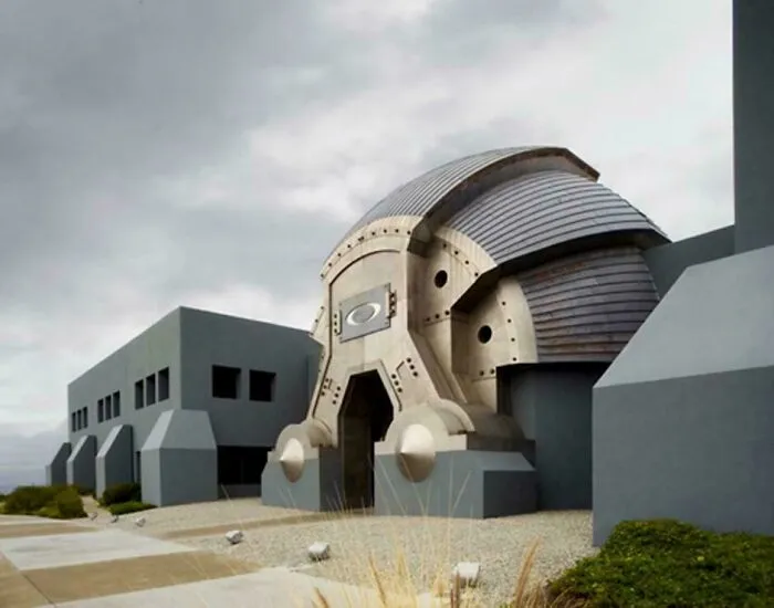 Futuristic building with an ominous design and dark gray structures, fitting the supervillain headquarters evil aura theme.
