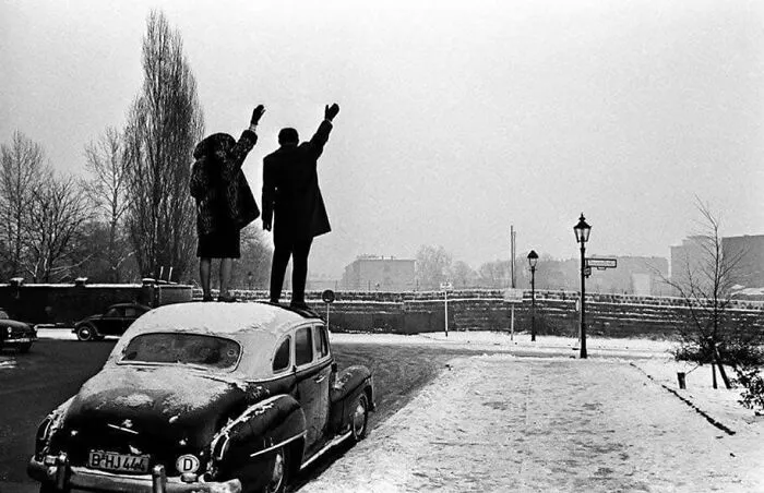 West Berliners Waving To Relatives Over The Berlin Wall, Christmas Day, 1961 By Leon Herschtritt