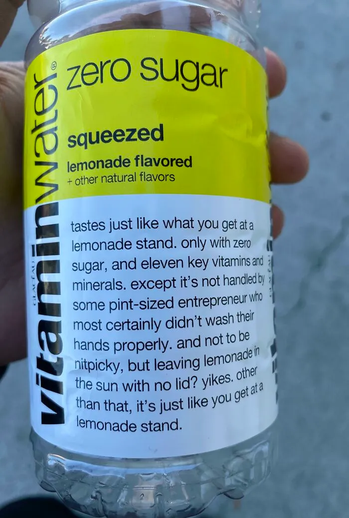 Vitaminwater bottle with passive-aggressive label humor comparing lemonade stand hygiene to its zero sugar drink.
