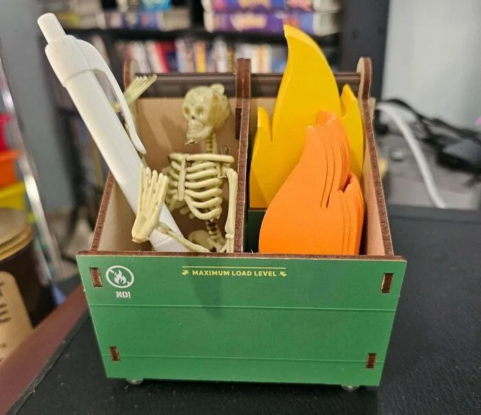Contain The Chaos With The <a Style="Display:inline;" Href="Https://Www.amazon.com/Genuine-Fred-Dumpster-Assorted-5280917/Dp/B08vn8vtqq?ie=utf8&th=1&linkcode=ll1&tag=bpmammoth-20&linkid=cc68c4aca8606e2ed26f91c6a200eee8&language=en_us&ref_=as_li_ss_tl" Target="_blank"><span Style="Font: Inherit; Color: #d74b1f;"> Dumpster Fire Pen Holder </Span> That's A Hot Mess Of Organization!