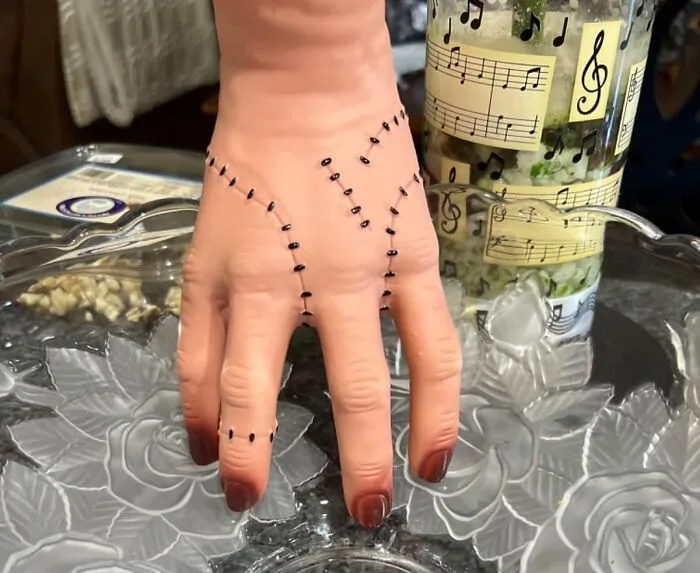 Bring A Little Creepy Charm To Your Home With <a Style="Display:inline;" Href="Https://Www.amazon.com/Rercarre-Wednesday-Cosplay-Halloween-Decorations/Dp/B0bvhk8p6y?ie=utf8&linkcode=ll1&tag=bpmelon-20&linkid=fefeb56984ab4aabb4748eb4fb6bd4f6&language=en_us&ref_=as_li_ss_tl" Target="_blank"><span Style="Font: Inherit; Color: #d74b1f;"> Thing</Span>, A Replica Of The Beloved Disembodied Hand From The Kooky And Lovable Addams Family