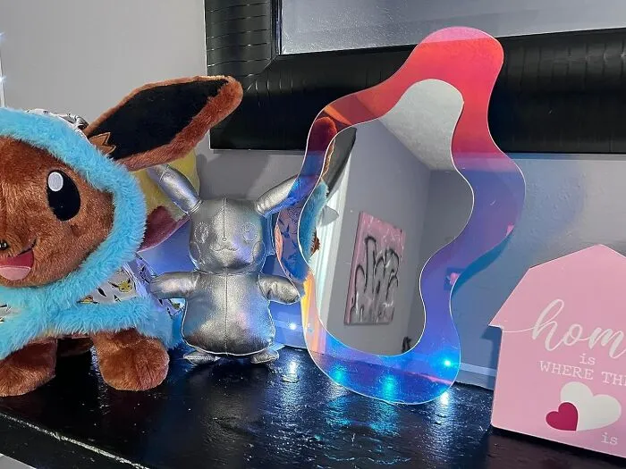Bring Back The Psychedelic Vibes Of The 80s With The <a Style="Display:inline;" Href="Https://Www.amazon.com/Irregular-Aesthetic-Frameless-Amorphic-Bathroom/Dp/B09md442ms?ie=utf8&th=1&linkcode=ll1&tag=bpcherry-20&linkid=f24ff9e1dfb7a95e78f60efe1c94fecb&language=en_us&ref_=as_li_ss_tl" Target="_blank"><span Style="Font: Inherit; Color: #d74b1f;"> Wavy Acrylic Mirror</Span>, A Groovy Way To Add Some Retro Flair To Your Space