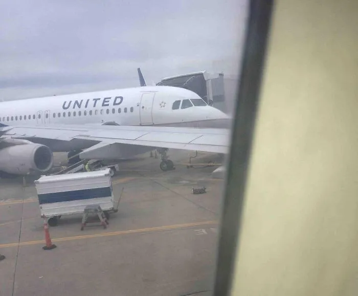 Just Watched This Bag Fall Out Of A Luggage Carrier And So Many Workers Just Walked Past It And Won't Put It In The Plane