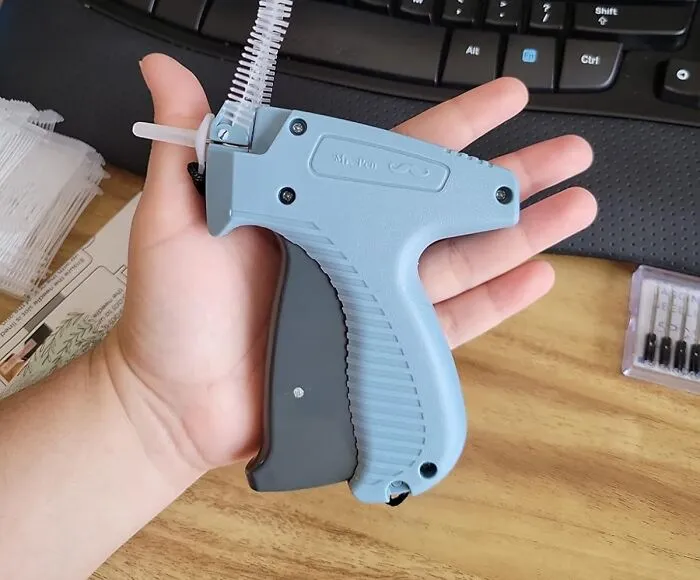 Tiktokkers Have Been Using A <a Style="Display:inline;" Href="Https://Www.amazon.com/Mr-Tagging-Fasteners-Clothing-Attacher/Dp/B0bqm7rg2k?ie=utf8&th=1&linkcode=ll1&tag=bpboar-20&linkid=fc7cc2d37fd6ea701eb1f90d863992ef&language=en_us&ref_=as_li_ss_tl" Target="_blank"> <span Style="Font:inherit;color:#d74b1f;"> Tagging Gun</Span> As A Quick Fix For Ill Fitting Clothes! Sold!