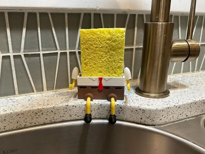 Low-Key Obsessed With The <a Style="Display:inline;" Href="Https://Www.amazon.com/Generic-Self-Draining-Decrotive-Kitchen-Standard/Dp/B0d6v1c1pp?crid=3odnhg2v47uwi&dib=eyj2ijoimsj9.xj1l1eagrthqyusezpndx5zhp3og9xzbwomzed3egt0eaqz1zvdzp0citkzqexb0abyex84xtk73vjlozoease2unrhftyijhll79_lubyodqdvtjkvqp3uw1a9er6p6i6m8ok9qdu0_e7y-Af3domgpb_rlafqfndwysbw7nklkudzj0yq3rbsqieybvvvxuehzen-Jghf2kwavhfcjofroggrea8lnh2hrqupiomtkmrl3uzdi8wn0f9xmo1xd-Kvjy9h3xne2fxqz7jishhneoazfc9nm7hojj6spwby.ayi5ya1wu87ycsnwwxc75ogx0jew-Muu69lutj1in8m&dib_tag=se&keywords=funny+kitchen+items&qid=1741855813&sprefix=funny+kitchen+items%2caps%2c180&sr=8-15-Spons&sp_csd=d2lkz2v0tmftzt1zcf9tdgy&psc=1&linkcode=ll1&tag=bppear-20&linkid=ce2400dc97697b33f27868cbdcb518f0&language=en_us&ref_=as_li_ss_tl" Target="_blank"><span Style="Font: Inherit; Color: #d74b1f;"> Spongebob Sponge Holder</Span> That's Making Adulting A Little More Bearable, One Sponge At A Time