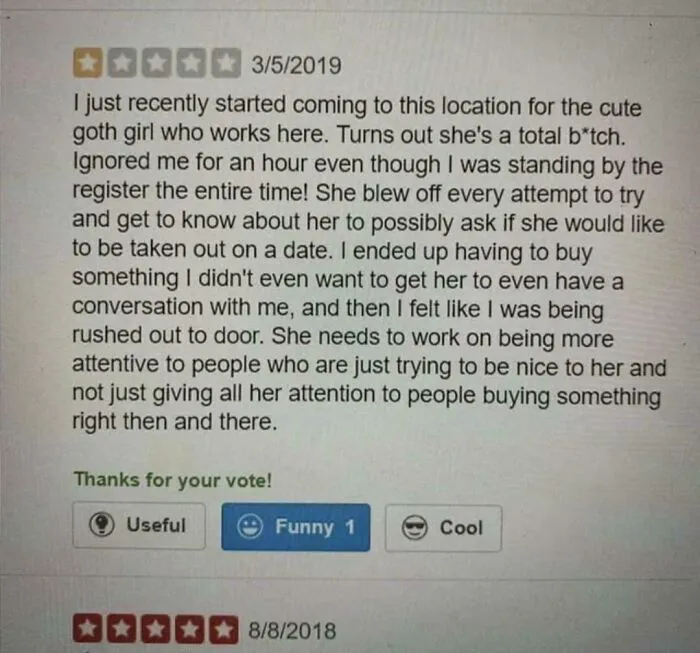 Customer review about employee with goth style, expressing dissatisfaction over perceived rudeness and attentiveness.