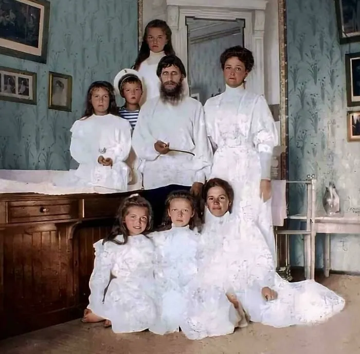 A Colorized Photo Of Grigori Rasputin With The Last Empress Of Russia And Her Five Children In 1908