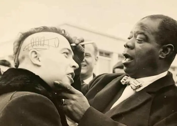 Louis Armstrong Signs A French Punk (1961)