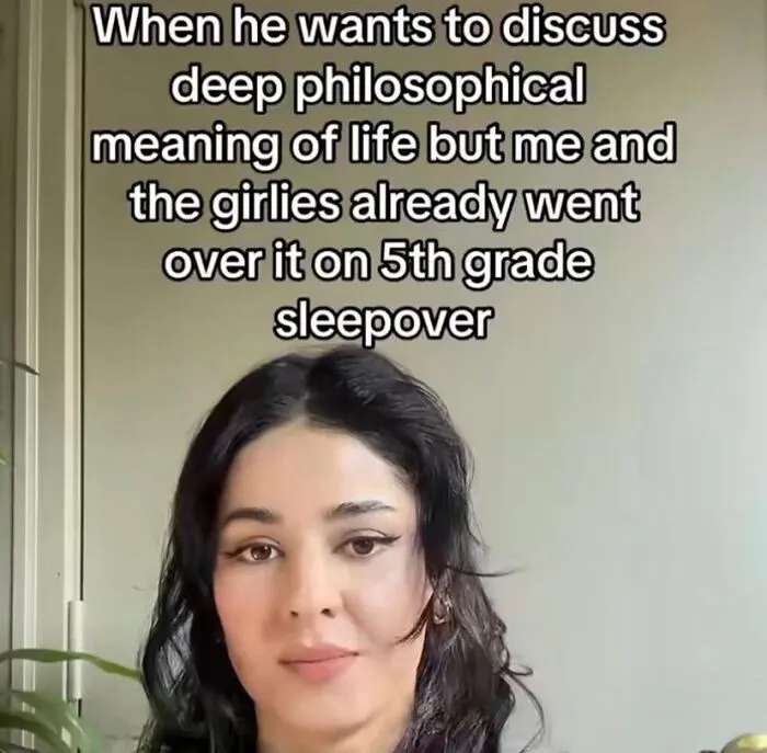 Young woman with a smirk, text above humorously highlights deep conversations at a 5th grade sleepover.