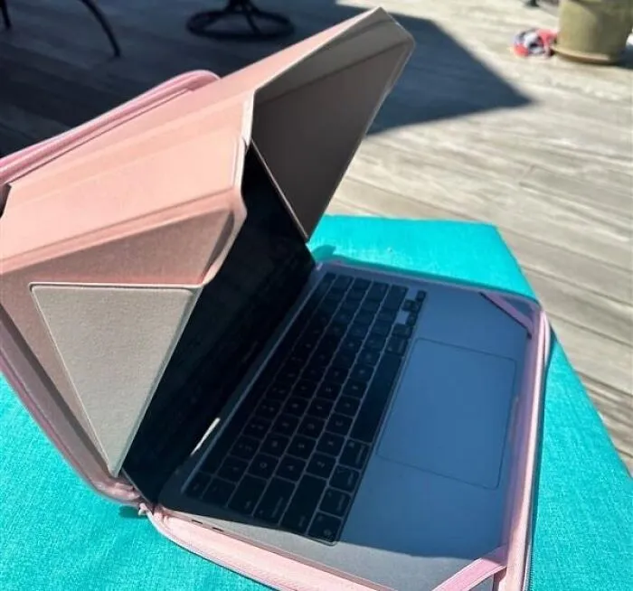 Stay Shaded And Stay Productive With This <a Style="Display:inline;" Href="Https://Www.amazon.com/Philbert-Danish-Design-MacBook-Laptop/Dp/B09kkrtvsj?ie=utf8&th=1&linkcode=ll1&tag=bparmadillo-20&linkid=120dfb2108d57f639d2ff93d429f5ca8&language=en_us&ref_=as_li_ss_tl" Target="_blank"><span Style="Font: Inherit; Color: #d74b1f;"> Laptop Sun Shade Sleeve </Span> That Blocks The Glare And Keeps Your Work On Track