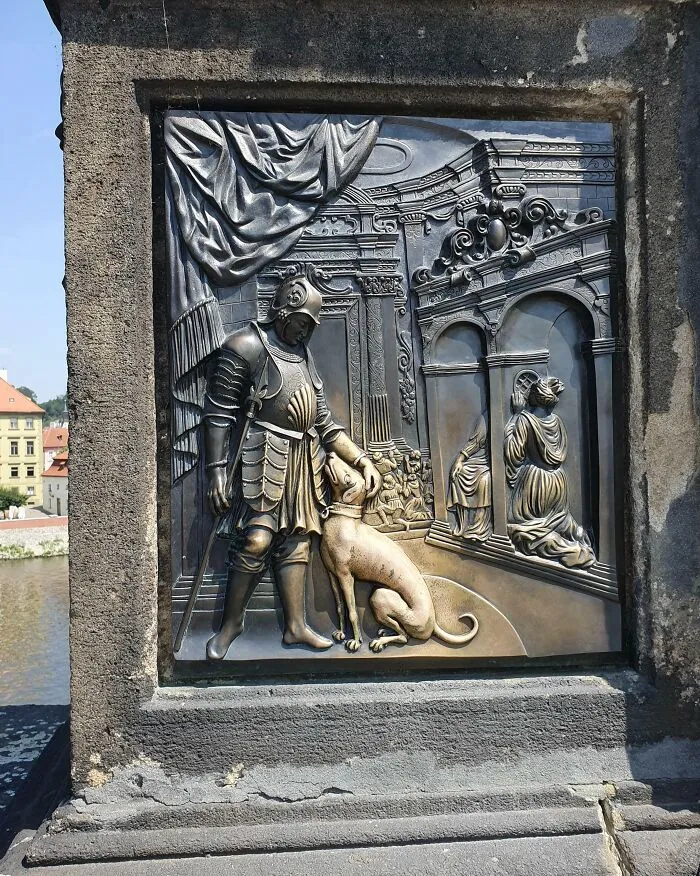The Way That The Statue Has Been Worn By People Stroking The Dog On The Charles Bridge
