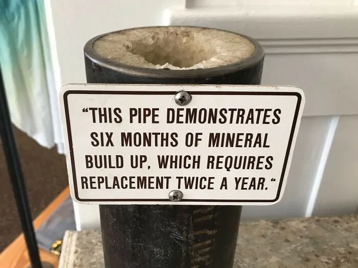 Pipe with mineral buildup over six months, showcasing effects of time and use.