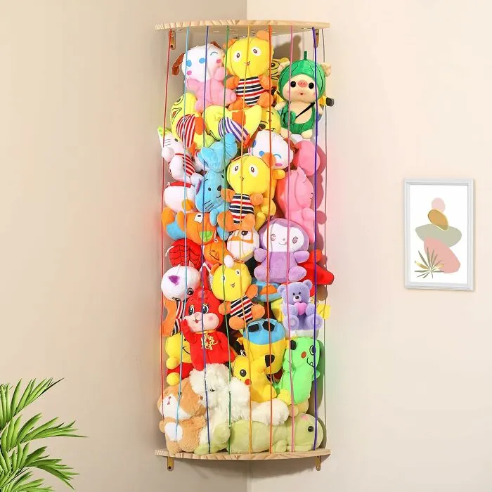  Nobody Puts Baby In A Corner, But You Can Put Baby's Toys In A Corner! This<span Style="Font:inherit;color:#d74b1f;"> Stuffed Toy Holder</Span> Makes Use Of Unclaimed Corner Real Estate For An Easy-To-Use Storage Solution