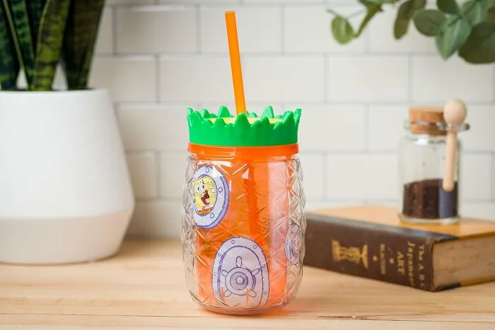 Whooo Lives In A Pineapple Under The Sea? Your Favorite Beverage Does, In The <a Style="Display:inline;" Href="Https://Www.amazon.com/Silver-Buffalo-Spongebob-Pineapple-Tumbler/Dp/B0cq6l1z8w?&linkcode=ll1&tag=bpfrog-20&linkid=5609fb325eaeb0a4d2b2f9d736c9eb99&language=en_us&ref_=as_li_ss_tl" Target="_blank"><span Style="Font: Inherit; Color: #d74b1f;"> Spongebob's House Drink Tumbler </Span>, Where Every Sip Is A Bikini Bottom Blast!