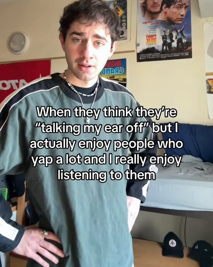Man in casual clothes shares a funny meme about enjoying chatty people.