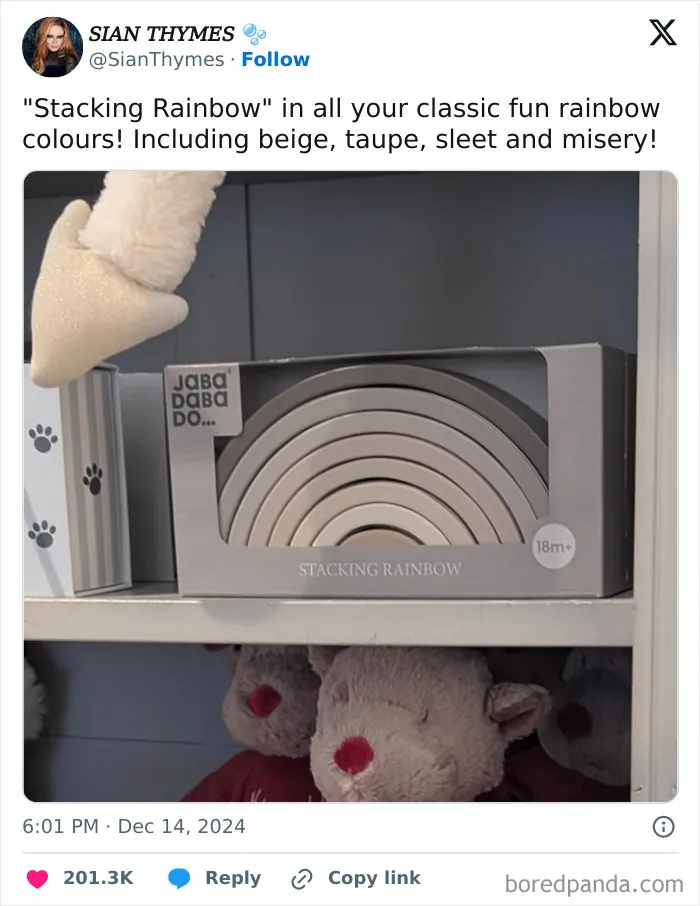 Hilarious meme about a "Stacking Rainbow" toy in dull colors like beige, taupe, and sleet on a shelf.