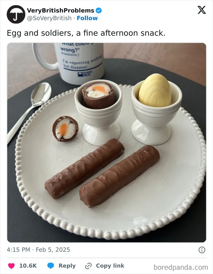 British problems depicted with chocolate egg and fingers on a plate, and a humorous mug in the background.