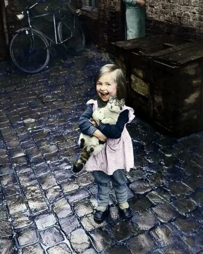 Young French Girl Showing Off Her Cat, 1959