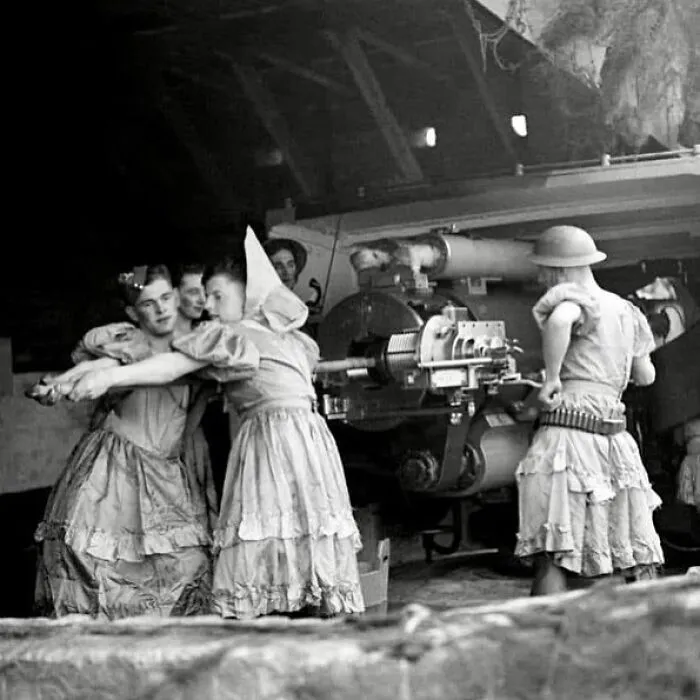 Soldiers (Who Were Interrupted During Rehearsals For A Drag Show By An Air Raid) Manning Anti-Aircraft Guns At The Royal Artillery Coastal Defence Battery At Shornemead Fort, Kent, England, 1940