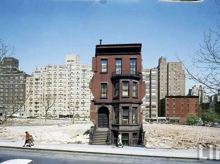 Lone Brownstone Standing At 215 E 68th St In New York City, New York. 1881-1959