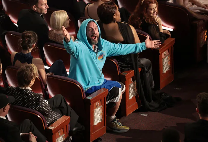Adam Sandler 'Walks Out' Of Oscars After Joke About His Casual Outfit