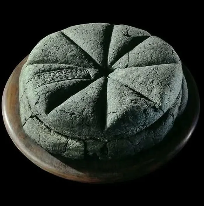 A Loaf Of Bread With A Stamped Imprint Found In Herculaneum And Dated Back To The First Century Ad, Bears The Name Of Its Baker