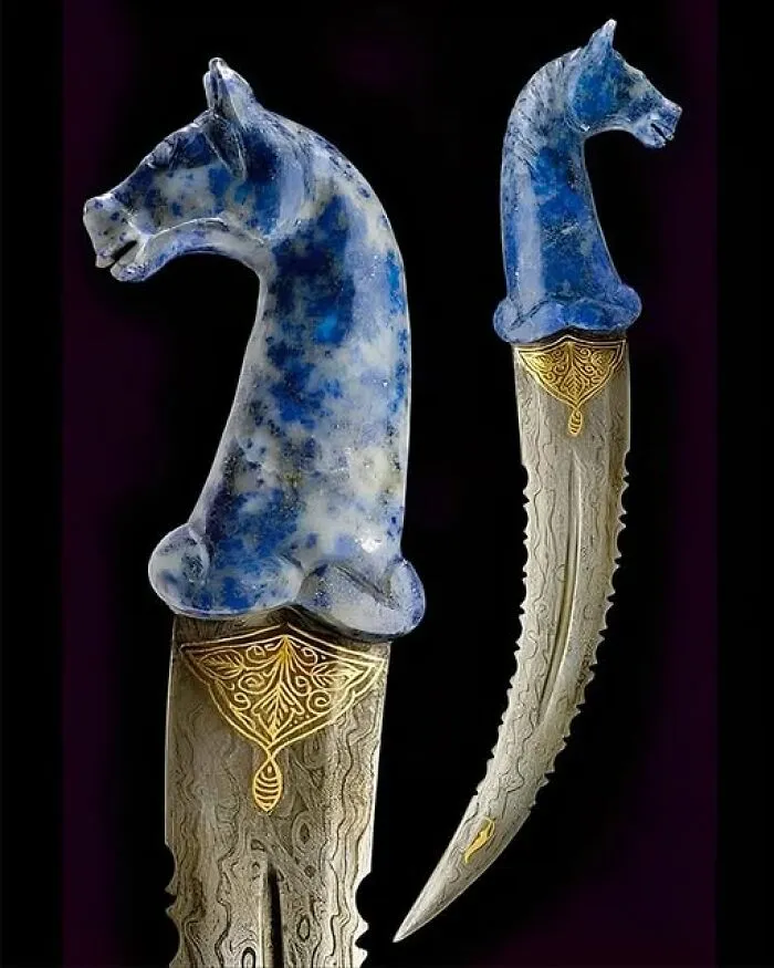 A Lapis Lazuli Horse-Head Hilt Gleaming With Gold—this Khanjar Is No Ordinary Dagger. Likely Crafted During The Opulent Mughal Era, Its Curved Blade And Exquisite Detailing Mark It As Both Weapon And Artwork