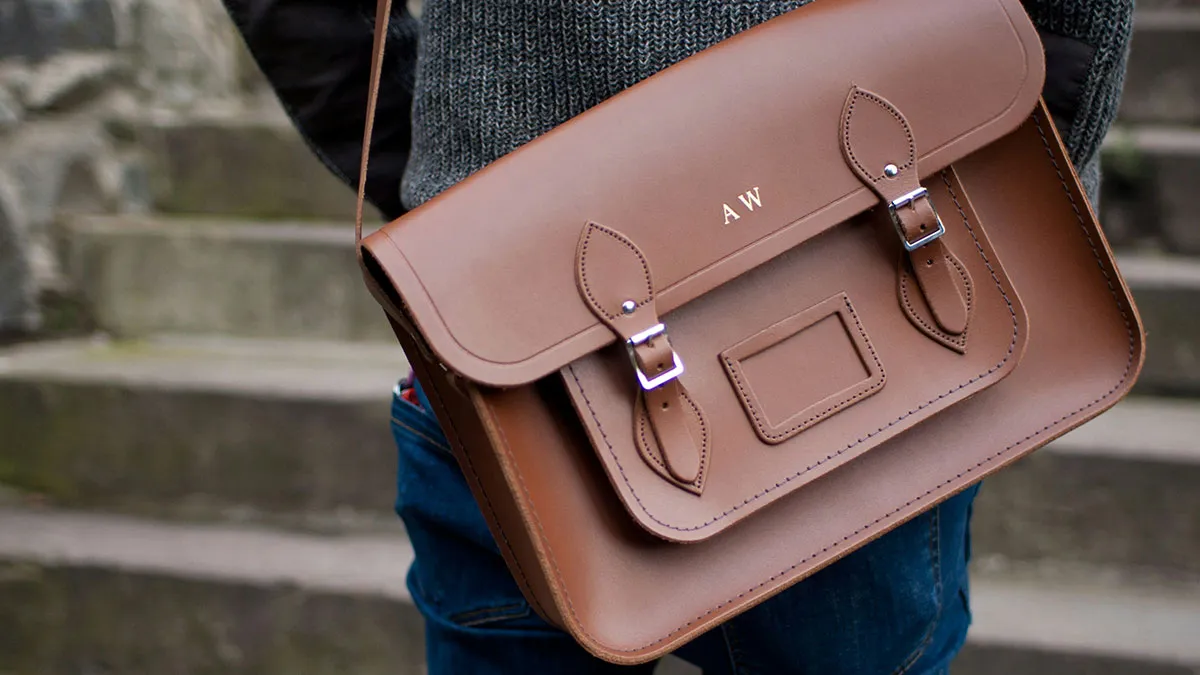 Guy Pours Coffee On Friend’s $1.8K Briefcase As He’s Checking It Out, Refuses To Take Responsibility 