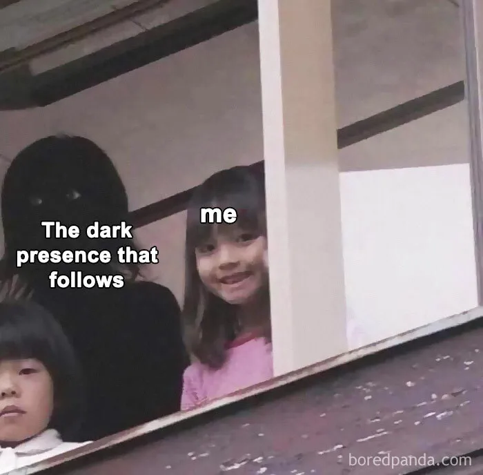 Girl smiles beside dark figure with text "The dark presence that follows" on mental health meme.