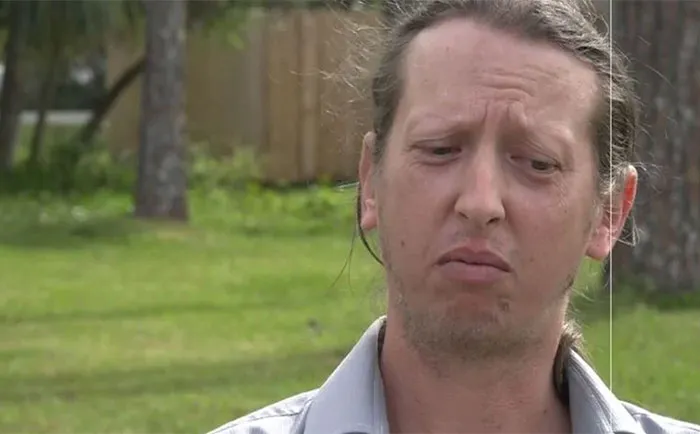 Man outdoors with a serious expression, possibly related to a famous Florida Man headline.