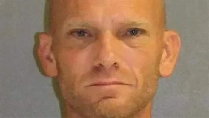 A mugshot of a Florida man with a neutral expression.