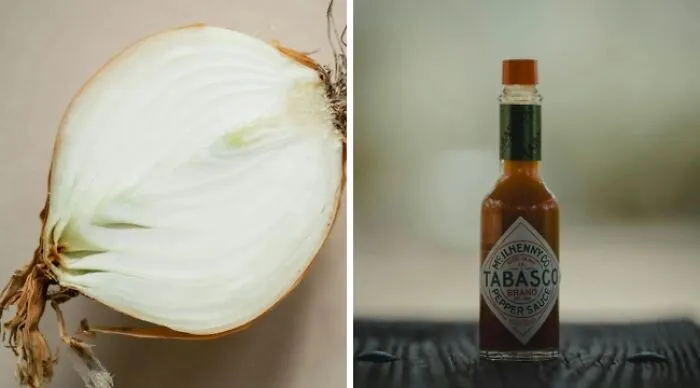 Would You Rather Have To Eat A Whole Onion Every Day Or Drink A Bottle Of Hot Sauce Every Day?