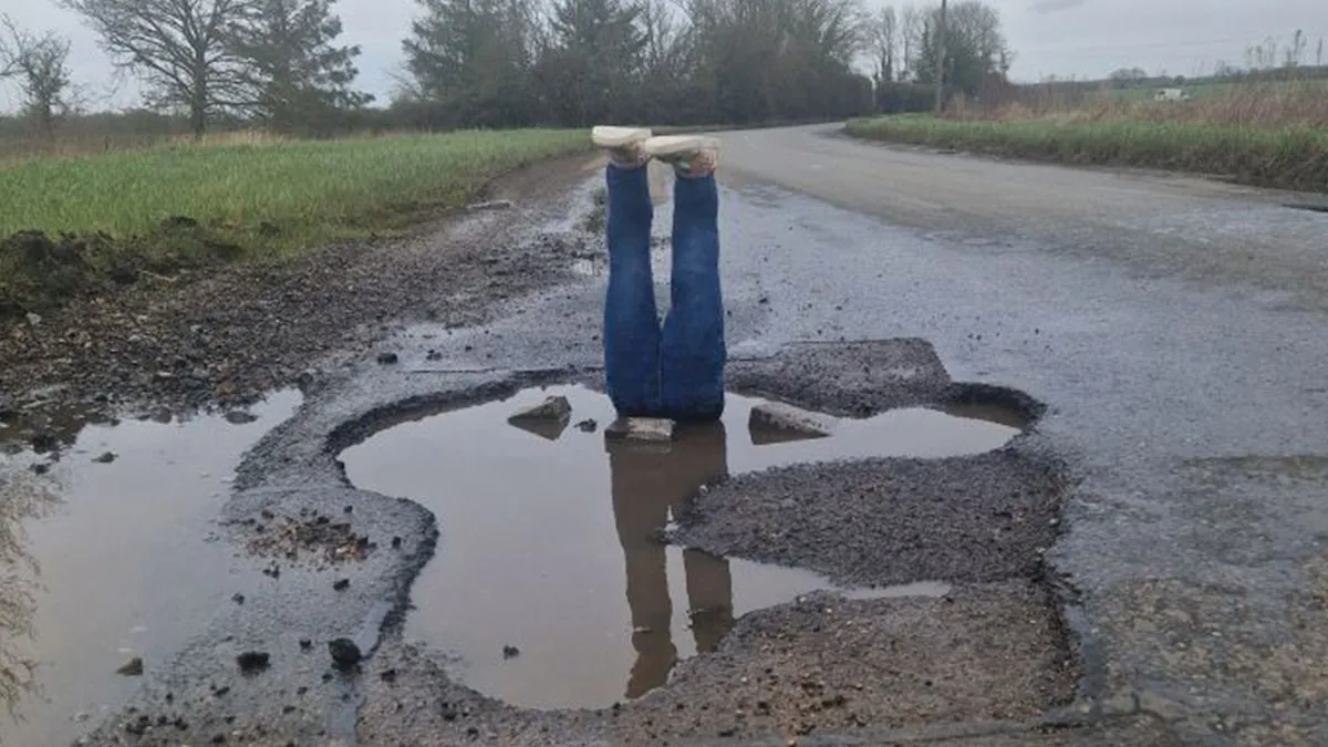 Pothole Prank Went Viral After Man Stuffed "Legs" Into It To Get The Officials' Attention