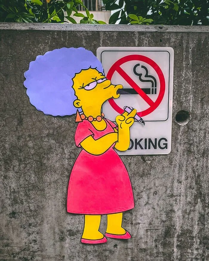 Street Artist Uses Paper Cutouts Of The Simpsons To Interact With The World Around Them (15 Pics)