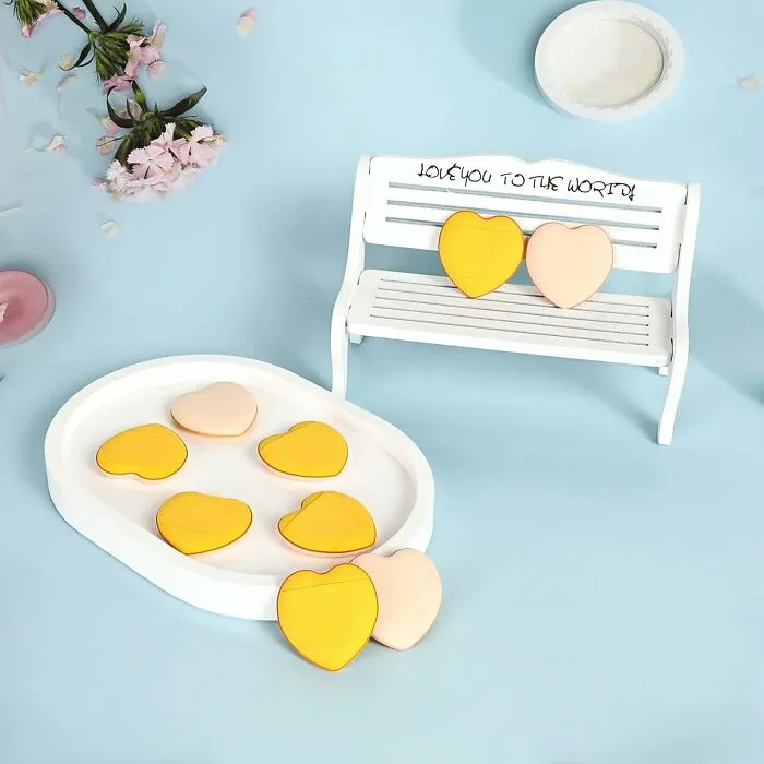 Add A Touch Of Whimsy To Your Makeup Routine With These Adorable <a Style="Display:inline;" Href="Https://Www.amazon.com/Sponges-Foundation-Suitable-Cosmetic-Tools%ef%bc%88yellow%ef%bc%89/Dp/B0dynfvj53?_encoding=utf8&s=bazaar&pd_rd_w=i3cax&pd_rd_wg=d66av&pd_rd_r=abcb75ed-0804-4f94-Aebb-3ba218ed16ae&content-ID=amzn1.sym.f957729a-Df0f-454c-Bc2f-B23e199c38b5&pos=title&th=1&linkcode=ll1&tag=bpshark-20&linkid=ef003c8ad052914e5cc5e10af6116c6b&language=en_us&ref_=as_li_ss_tl" Target="_blank"><span Style="Font: Inherit; Color: #d74b1f;"> Heart-Shaped Powder Puffs </Span>