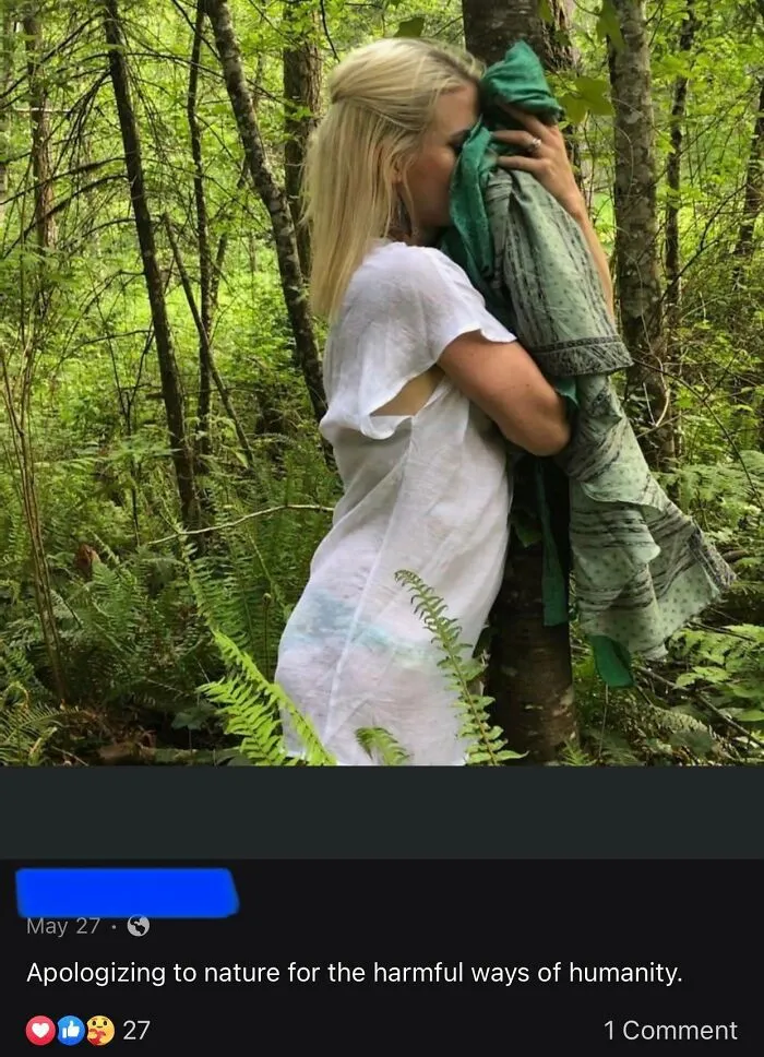 A person embracing a tree in the forest, expressing remorse for humanity's impact on nature, capturing a moment of cringe.