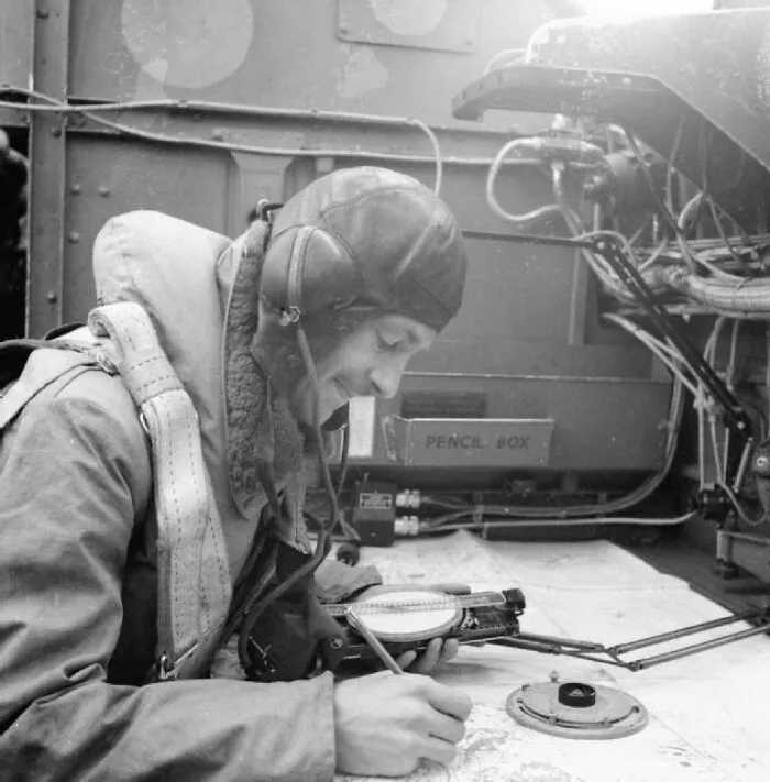 The Navigator At Work On His Charts In The Stirling Aircraft
