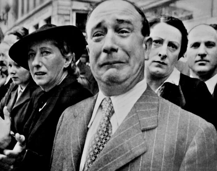 A Frenchman Weeps As German Soldiers March Into The French Capital, Paris, On June 14, 1940, After The Allied Armies Had Been Driven Back Across France
