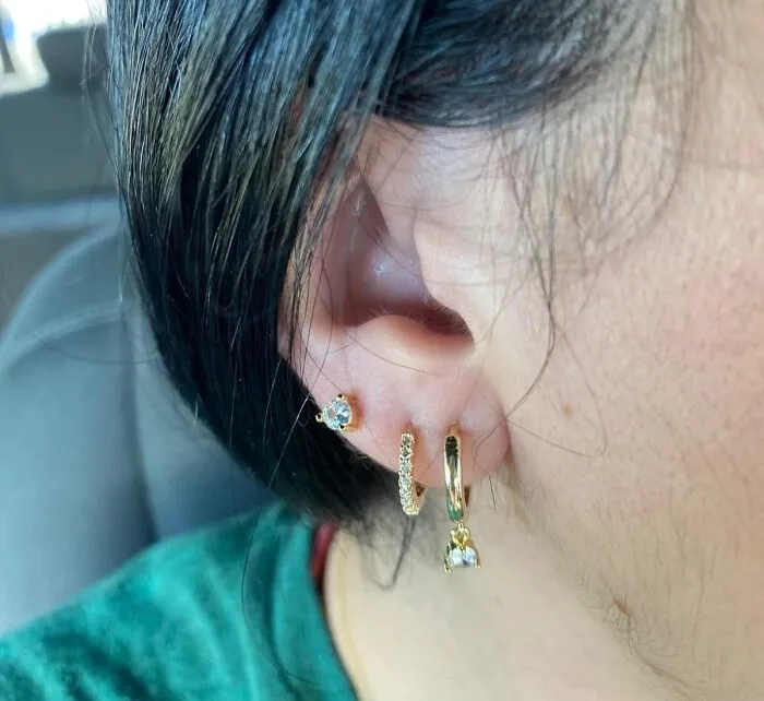 When Your Bank Account Says "No" But Your Instagram Aesthetic Says "Yes", A Stack Of <a Style="Display:inline;" Href="Https://Www.amazon.com/Freekiss-Earrings-Earring-Hypoallergenic-Jewelry/Dp/B0cpt3nb6d?ie=utf8&th=1&linkcode=ll1&tag=bpgrape-20&linkid=517d7a6d783d7198fee86f67813e4fa8&language=en_us&ref_=as_li_ss_tl" Target="_blank"><span Style="Font: Inherit; Color: #d74b1f;"> Dainty Gold Jewelry </Span>  Is The Ultimate Form Of Self-Care (And Subtle Flex)