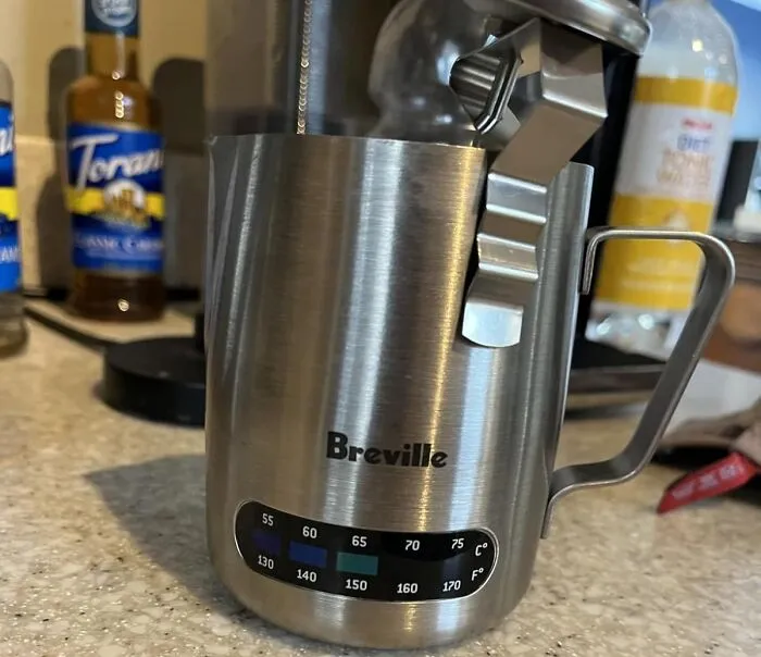 Steaming Milk (Like A Pro) Just Got Easier With The <a Style="Display:inline;" Href="Https://Www.amazon.com/Breville-Stainless-Control-Capacity-Bes003xl/Dp/B01a9c4pt0?ie=utf8&linkcode=ll1&tag=bpseal-20&linkid=b7676837b38b23b66303fdd6b3f2cb1b&language=en_us&ref_=as_li_ss_tl" Target="_blank"><span Style="Font: Inherit; Color: #d74b1f;"> Temperature Control Milk Jug </Span>, Because No One Likes A Lukewarm Latte, And Showing Off Your Barista Skills Is The Only Flex That Matters At Brunch